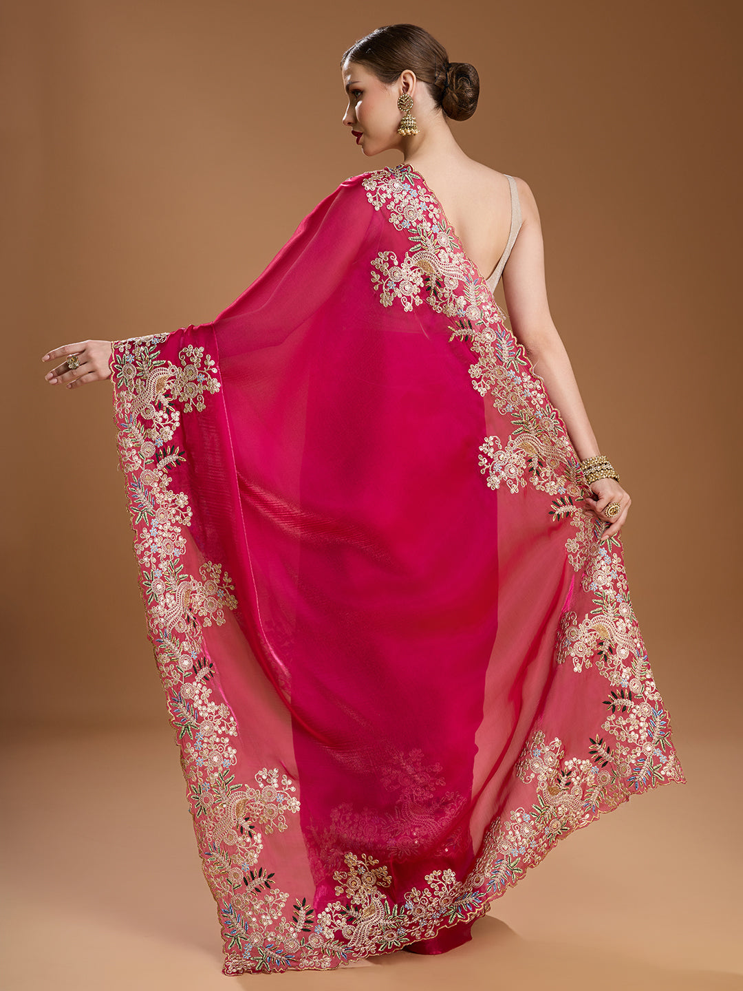 Elegant embroidered magenta saree for festive events