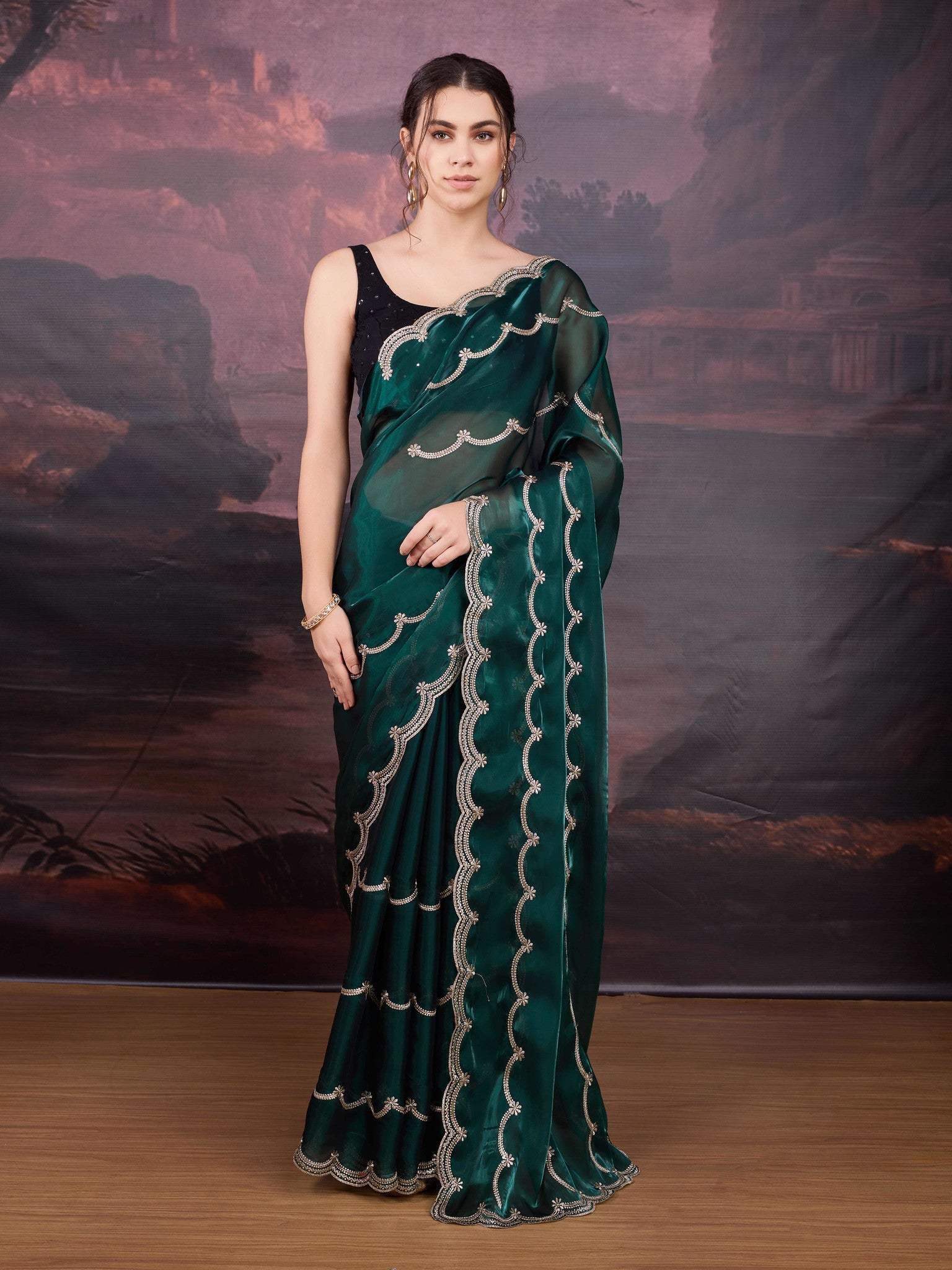 Green party wear saree in Jimmy Choo fabric
