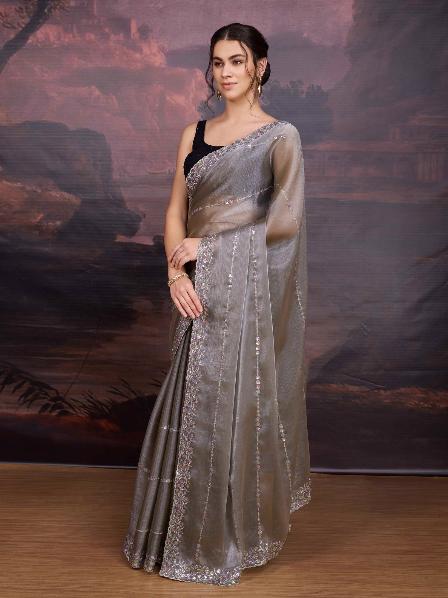 Grey shimmer saree with embroidered border