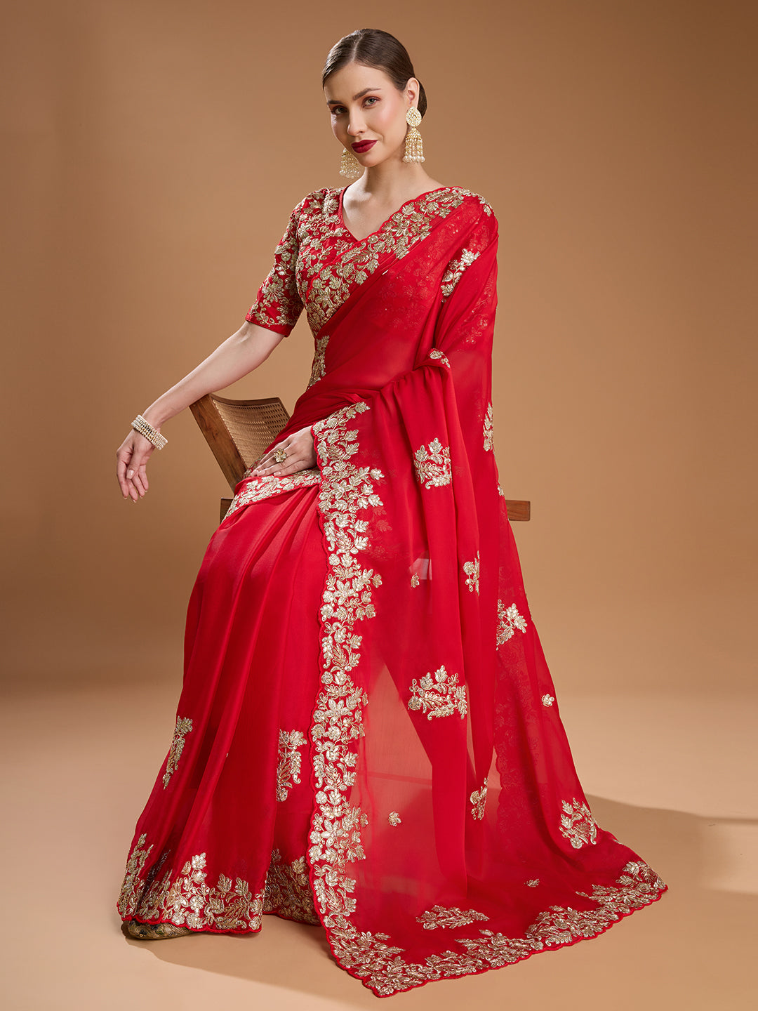 Wedding wear red embroidered saree with blouse

