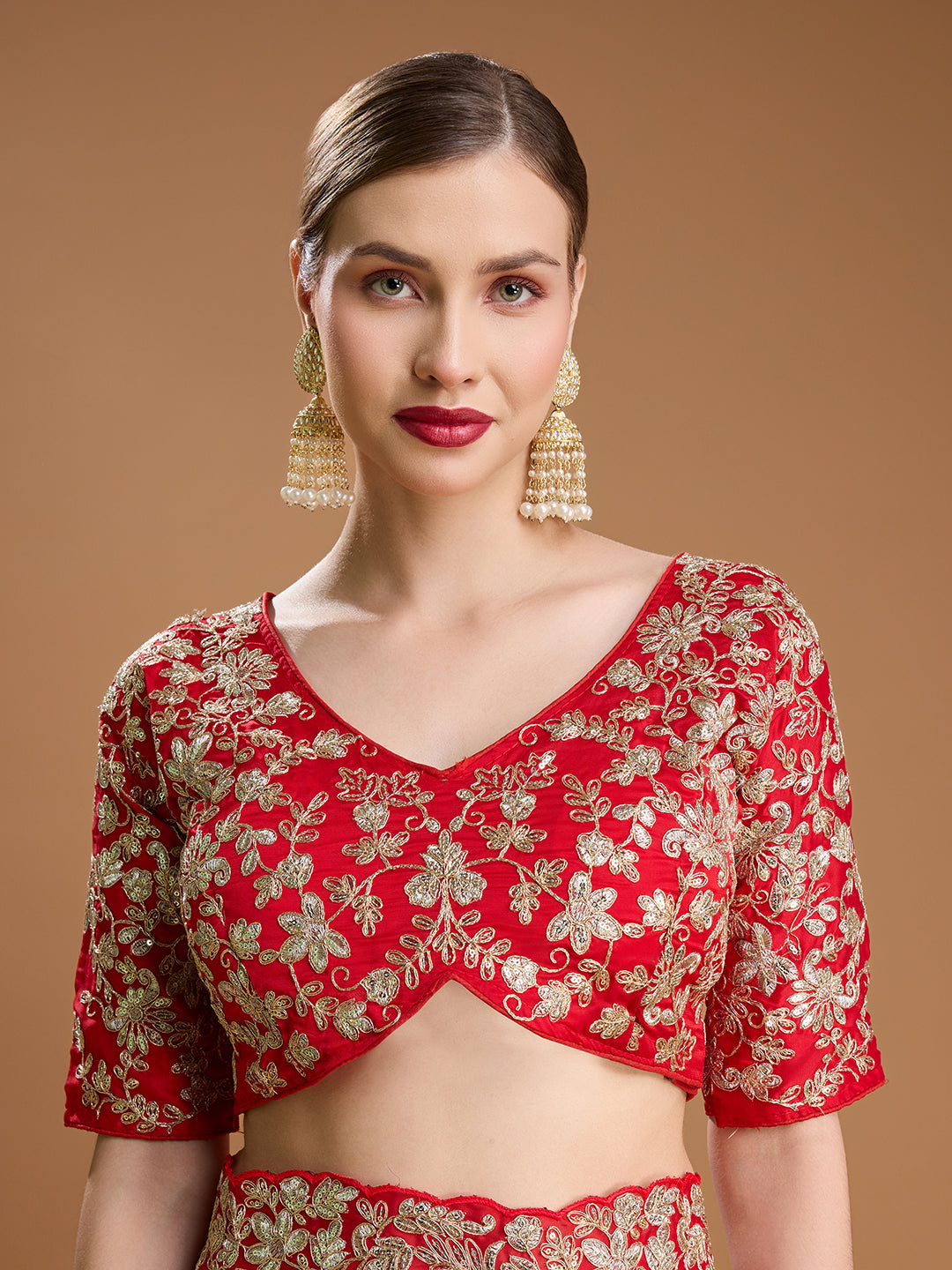 Elegant festive red saree in luxurious Jimmy Choo material

