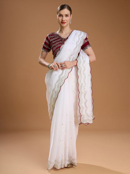 White embroidered saree with maroon blouse