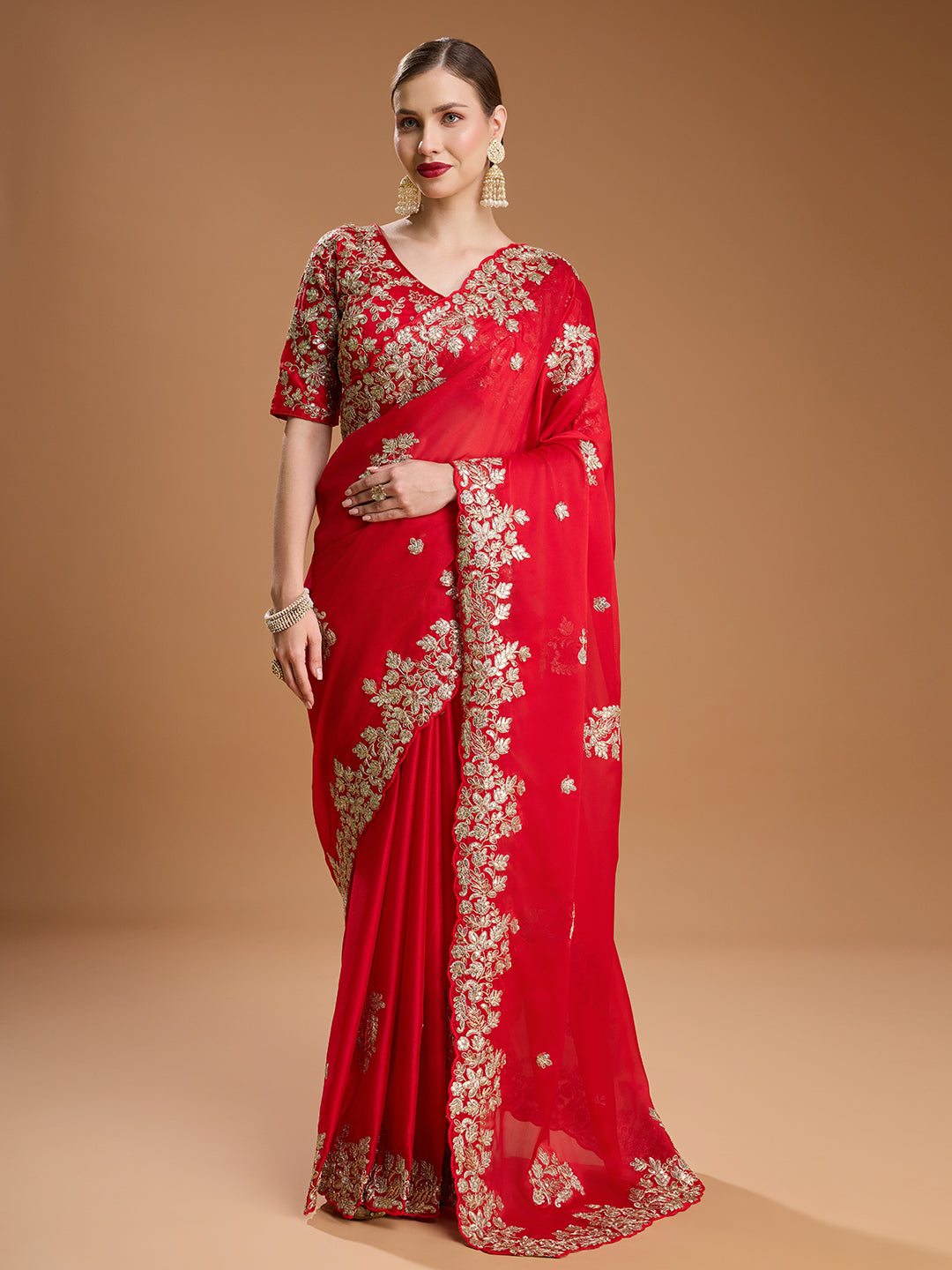 Red Jimmy Choo saree with embroidery for bride

