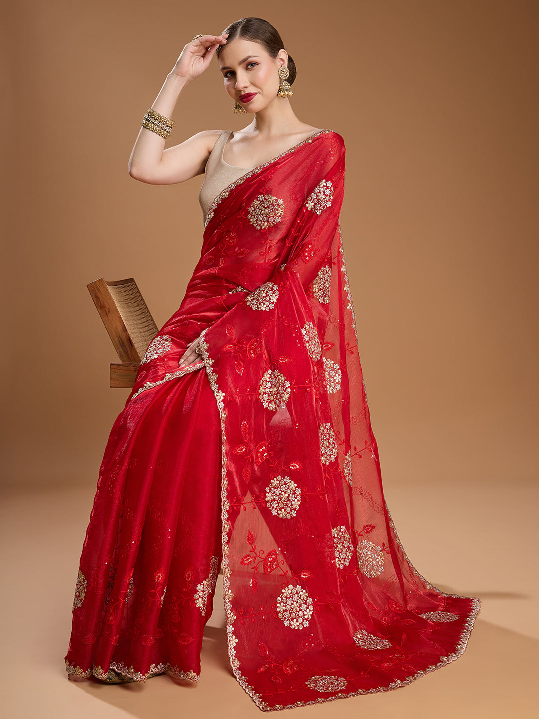 Heavy embroidered red saree in Jimmy Choo fabric