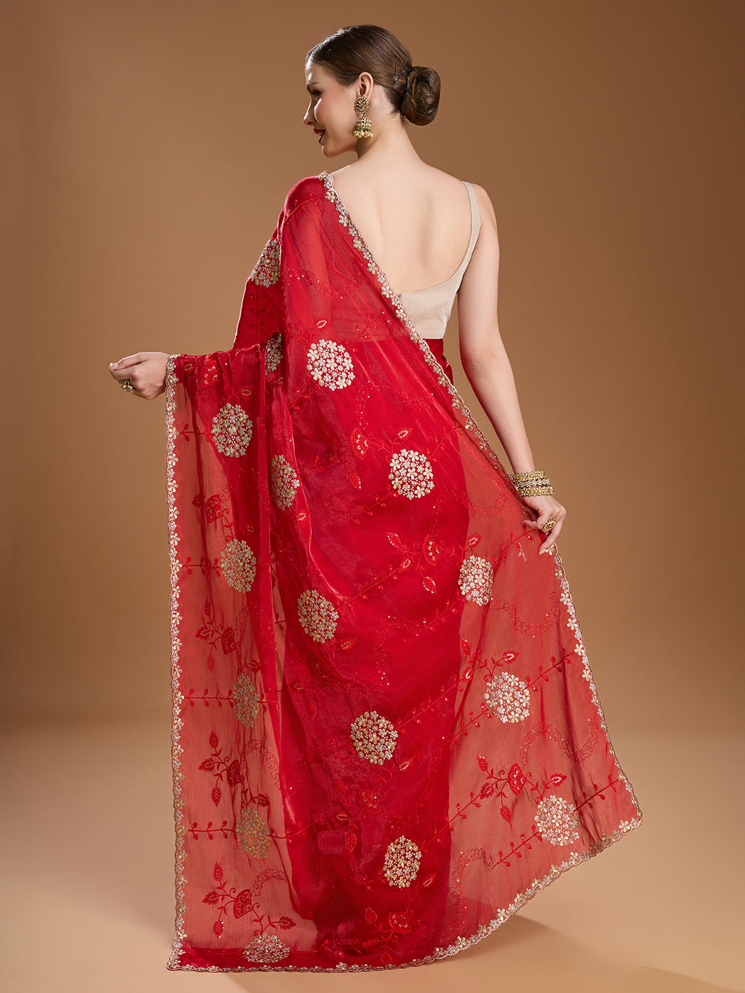 Traditional red saree for festive occasions