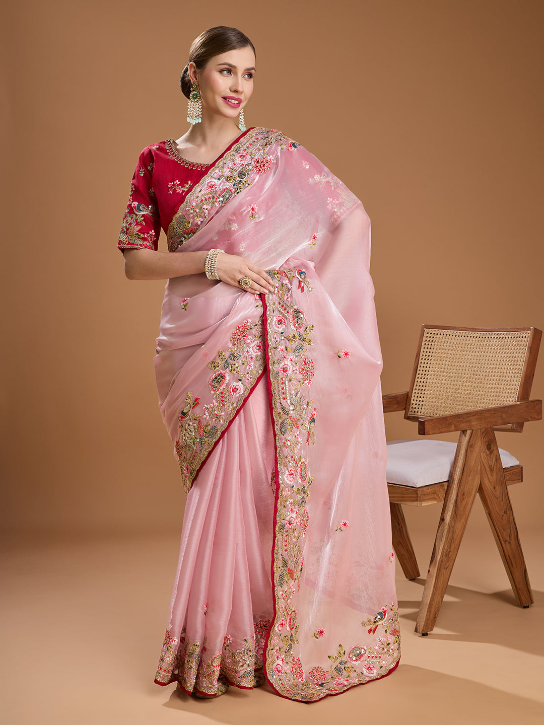 Soft pink embroidered saree for festive wear