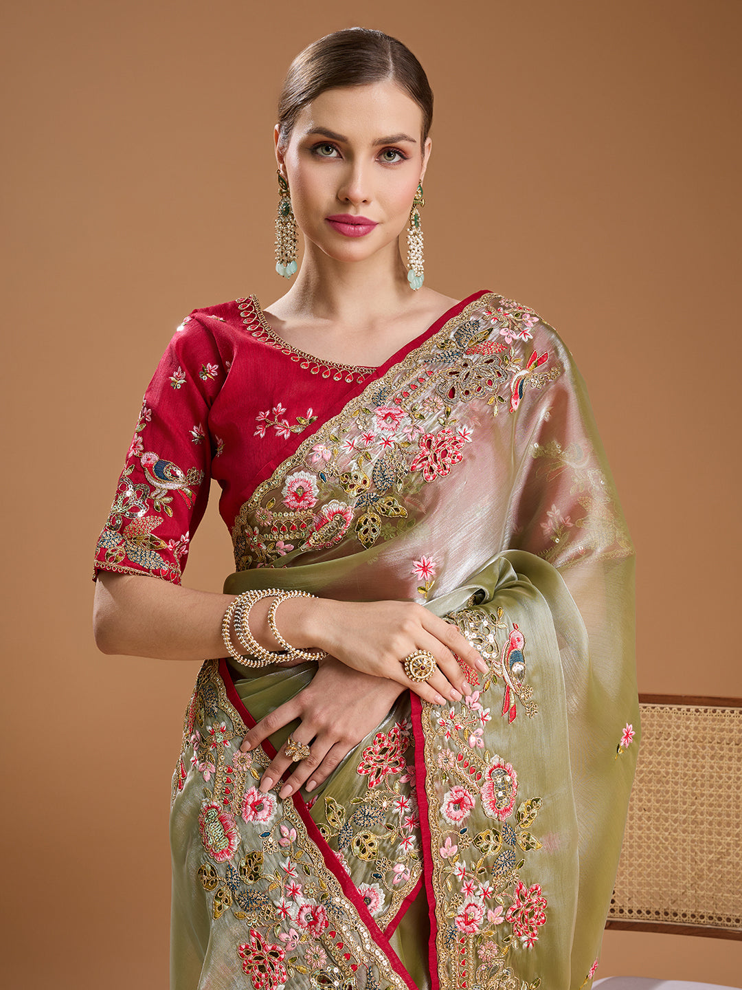 Embroidered olive green saree with sequin and coding work