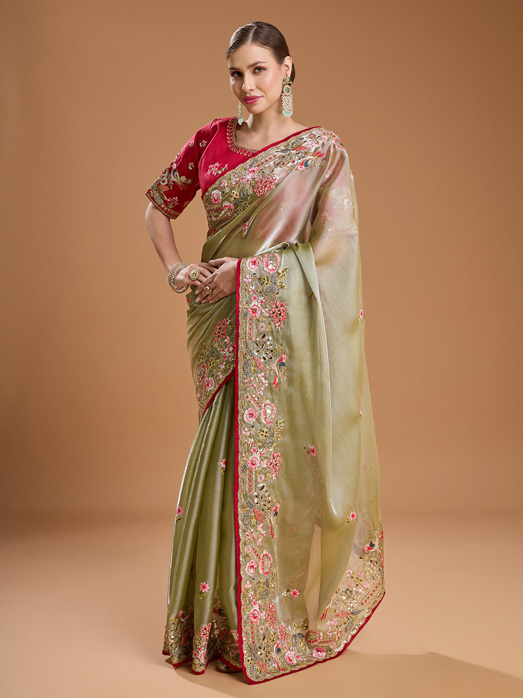 Olive green Jimmy Choo saree with red blouse