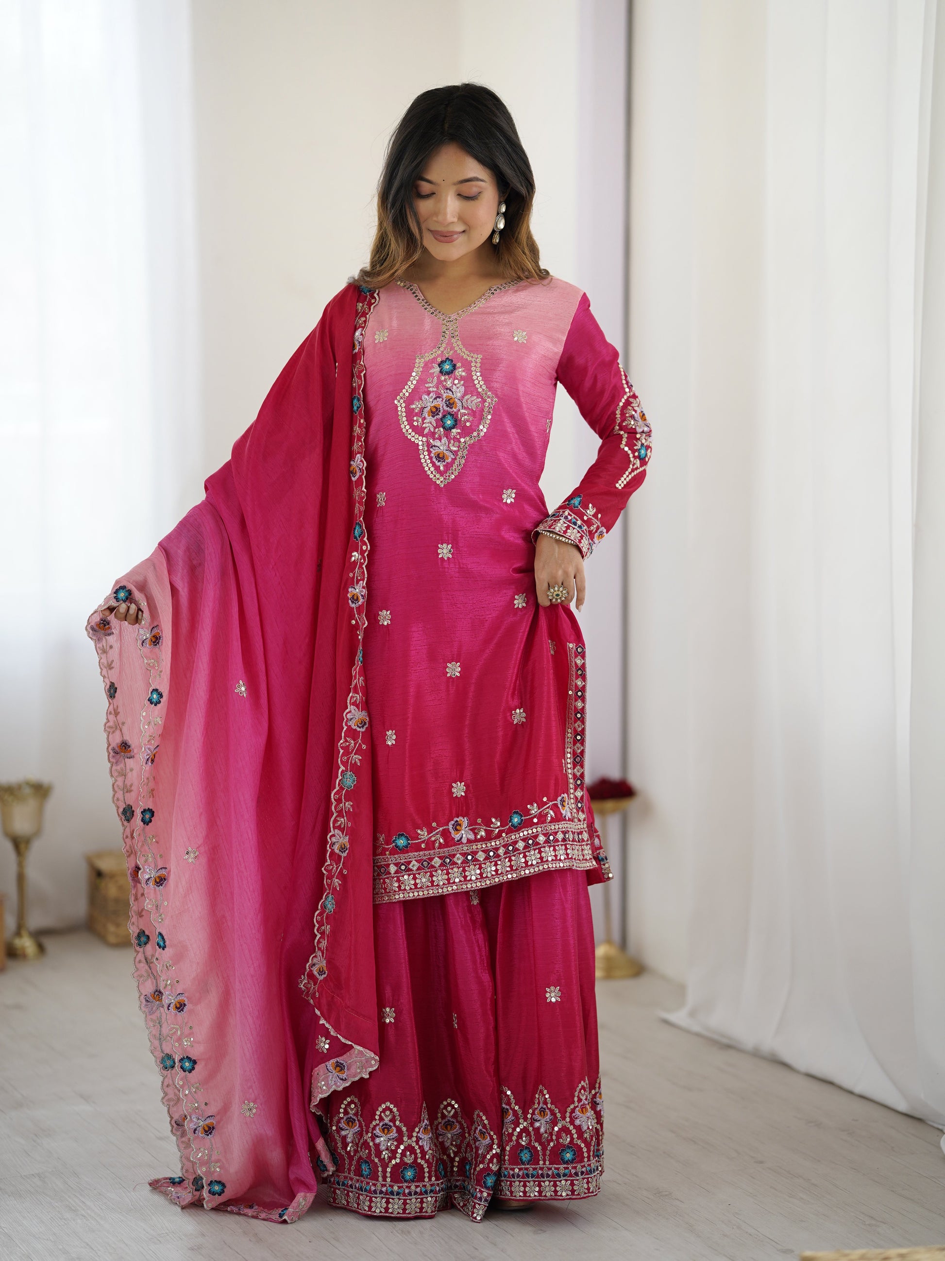 Elegant pink sharara dress with flare pants and matching dupatta
