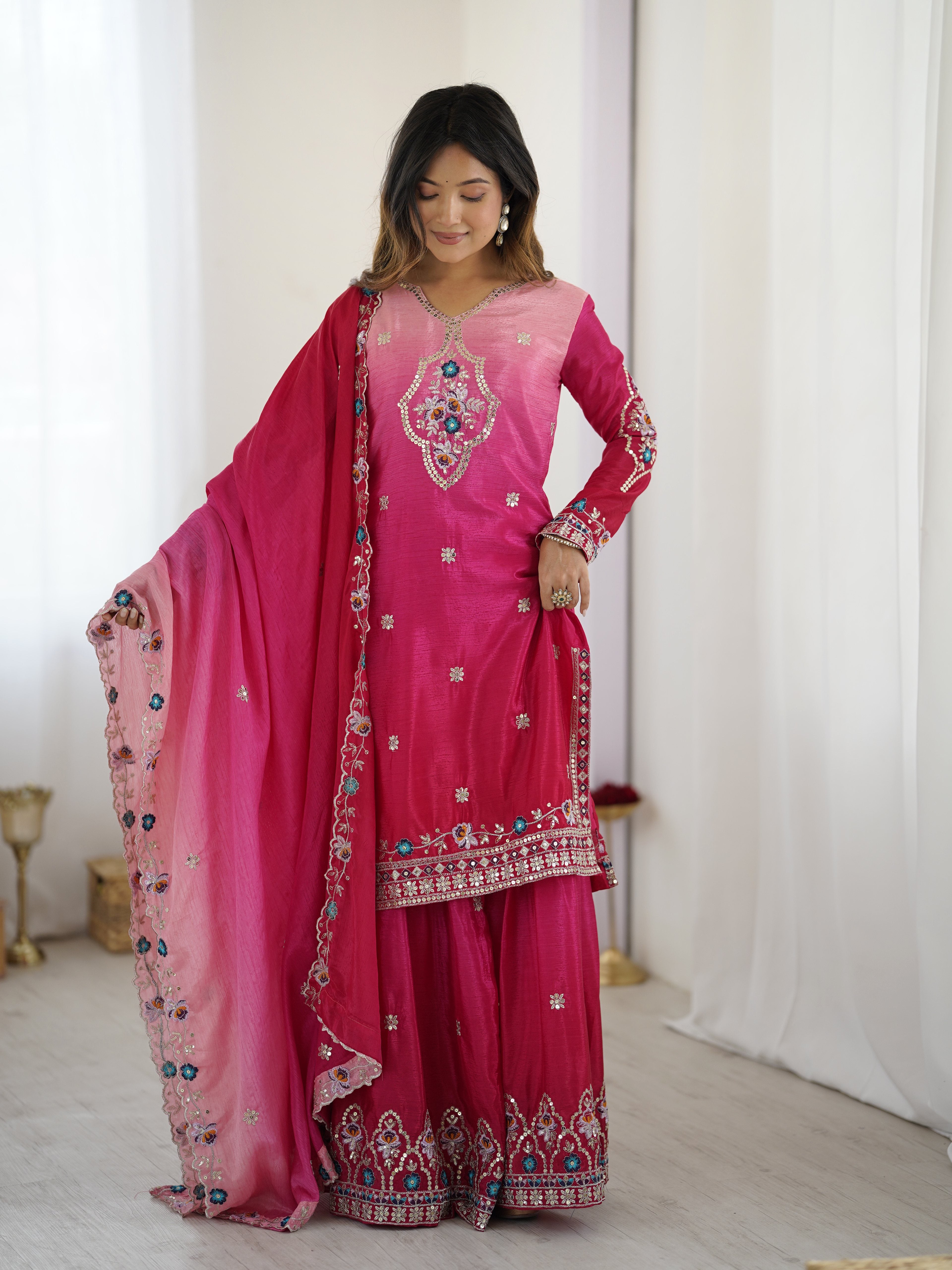 Elegant pink sharara dress with flare pants and matching dupatta