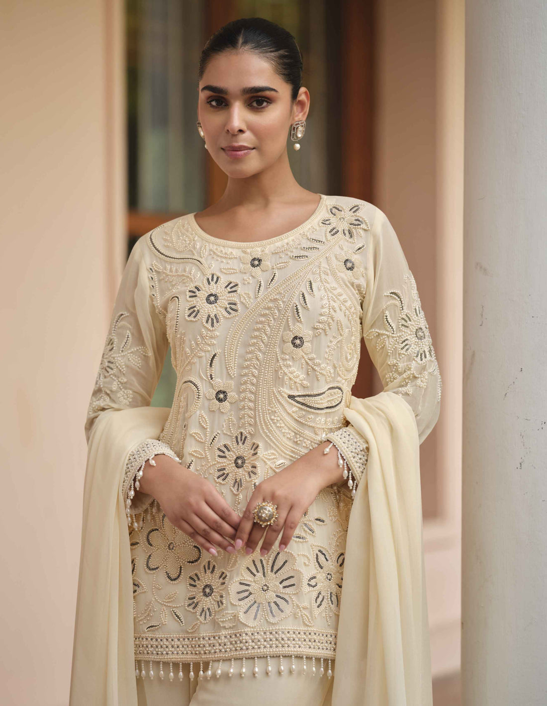 Beige Heavy Embroidered Real Georgette Palazzo Suit Palazzo Suit Anant Tex Exports Pvt.Ltd..