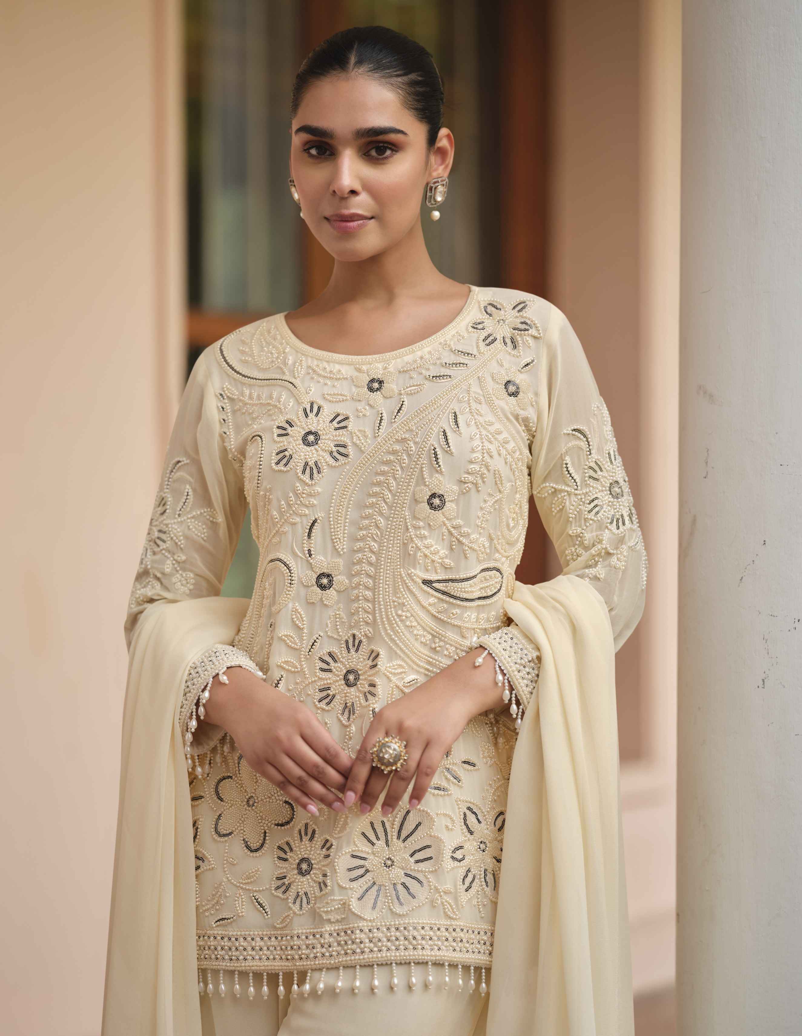 Beige Heavy Embroidered Real Georgette Palazzo Suit