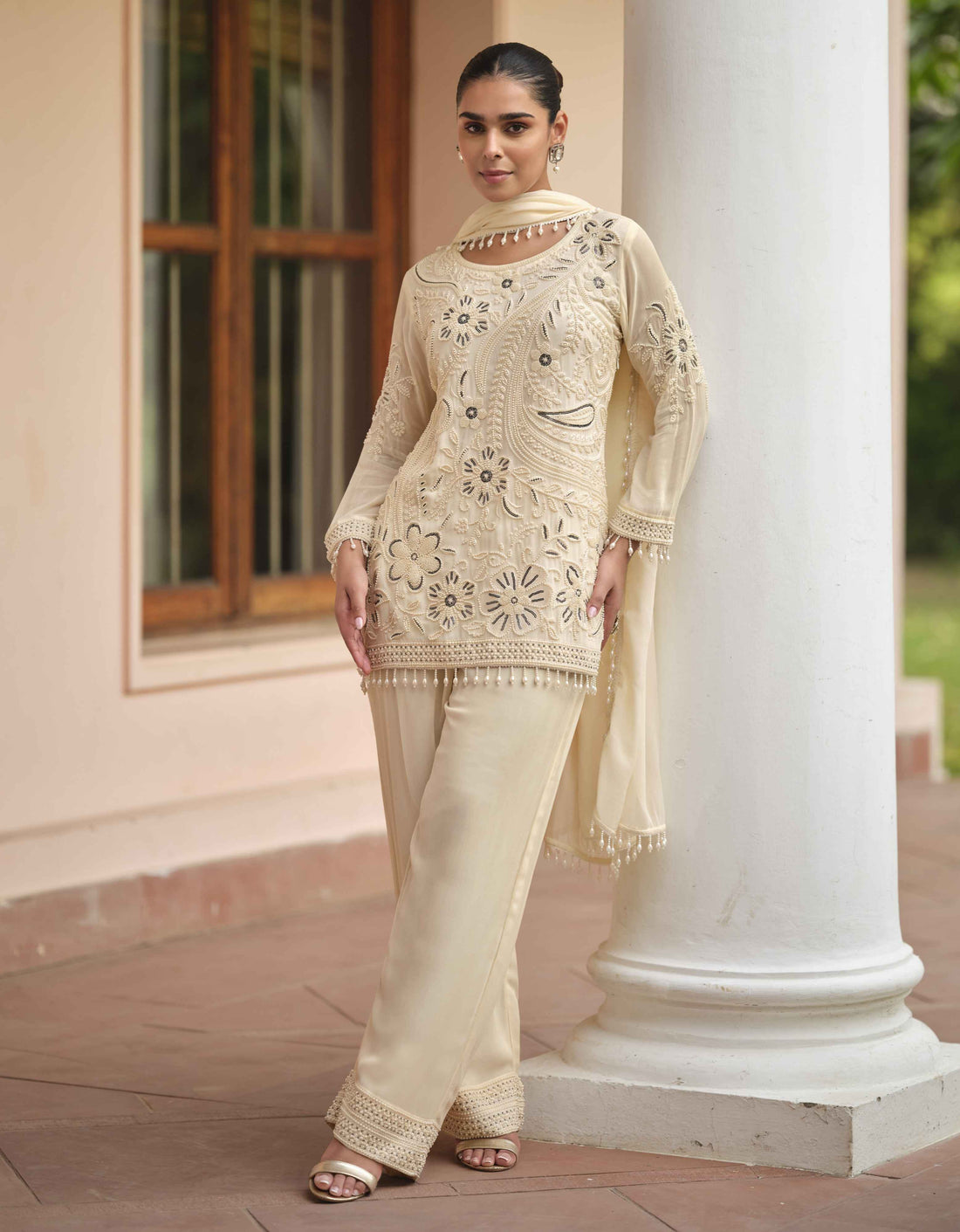 Beige Heavy Embroidered Real Georgette Palazzo Suit Palazzo Suit Anant Tex Exports Pvt.Ltd..
