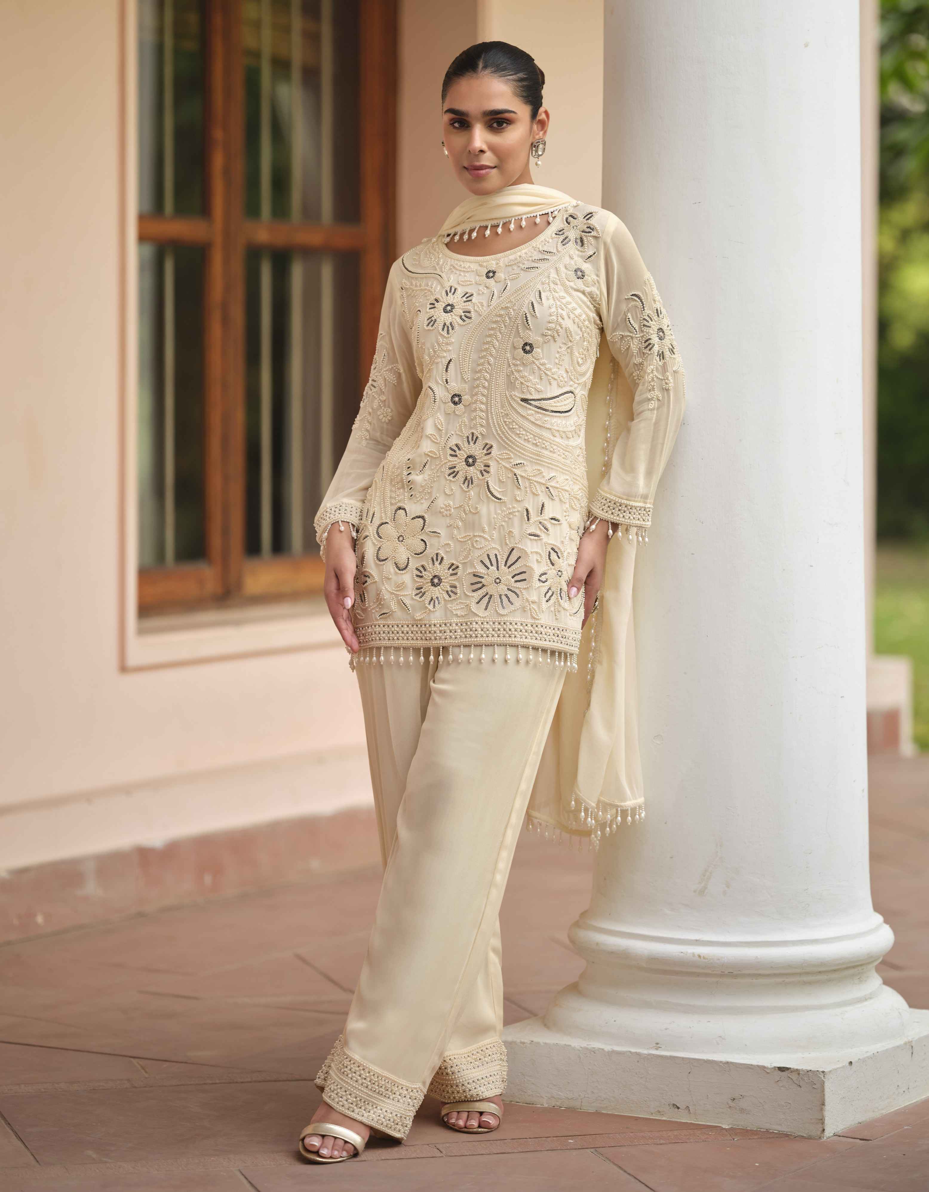 Beige Heavy Embroidered Real Georgette Palazzo Suit