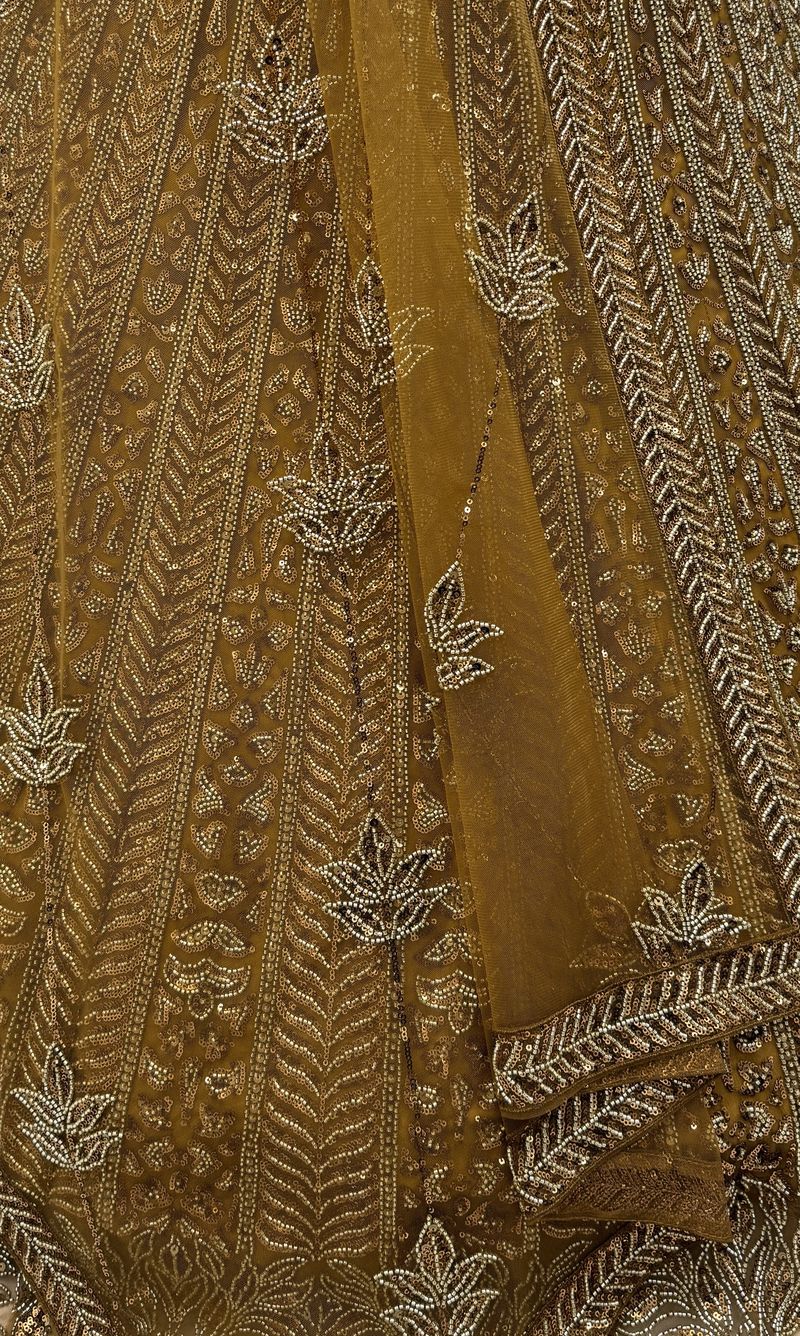 Golden Pure Soft Net Heavy Embroidery Work Bridal Lehenga 