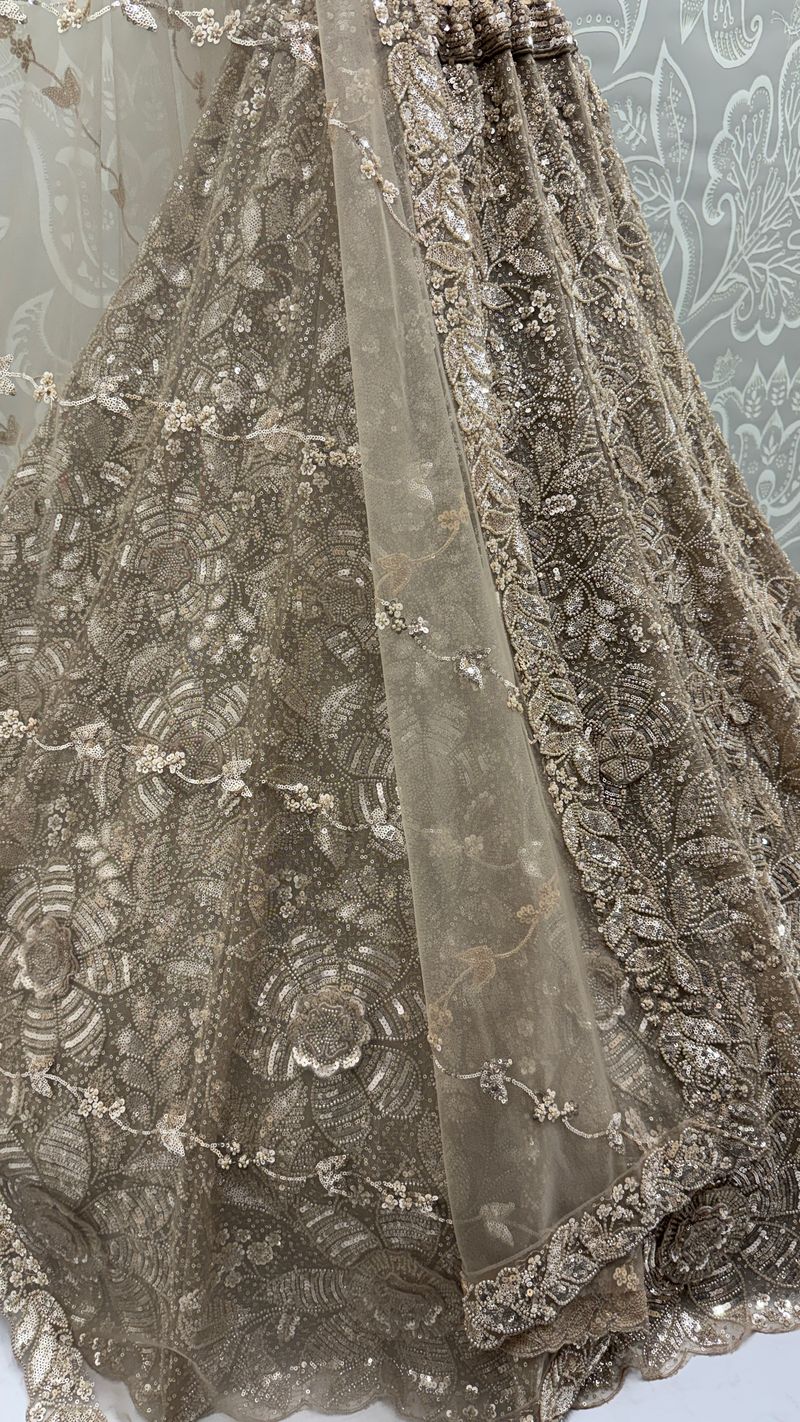 Chiku Pure Soft Net Heavy Embroidery Work Bridal Lehenga