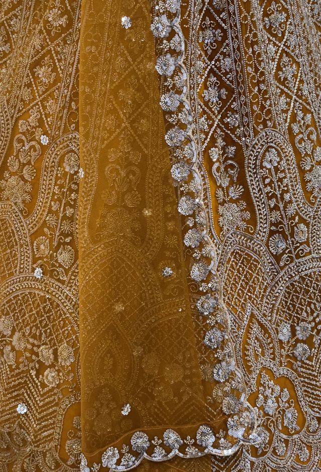 Rust Pure Heavy Net Motif Handwork Zari Sequins Work Bridal Lehenga Choli