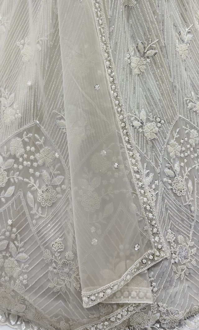 White Pure Heavy Net Motif Handwork Zari Sequins Work Bridal Lehenga Choli