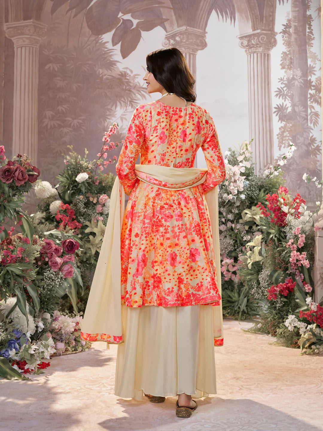 Cream and coral floral sharara set with handcrafted embroidery

