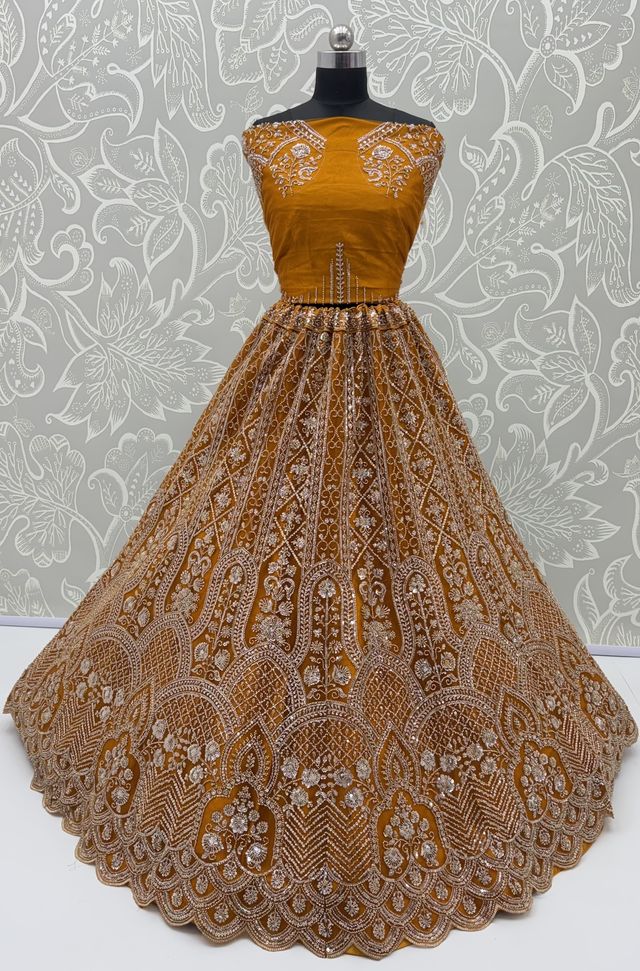 Rust Pure Heavy Net Motif Handwork Zari Sequins Work Bridal Lehenga Choli