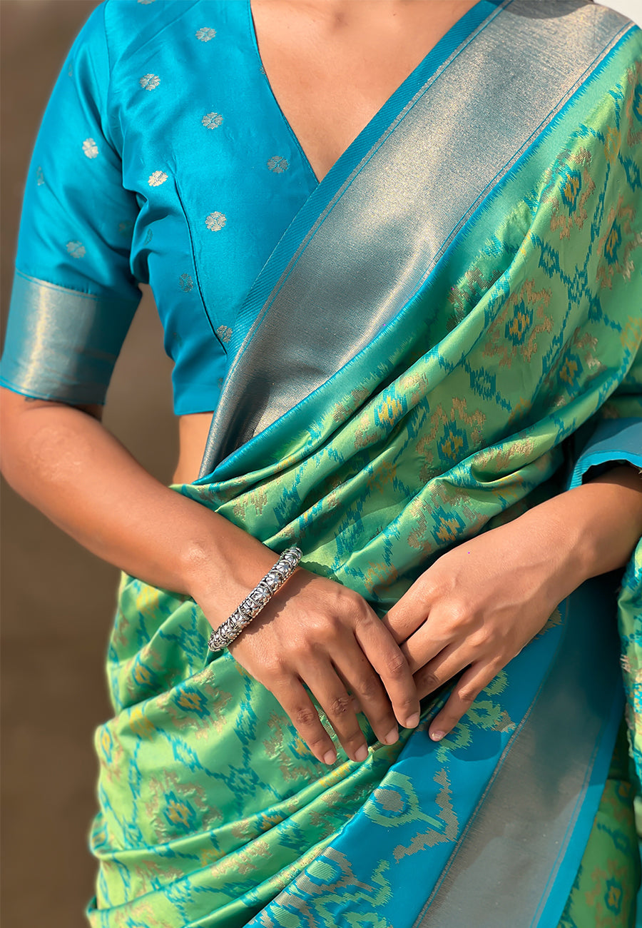 Pista Green Soft Silk Zari Woven Patola Saree