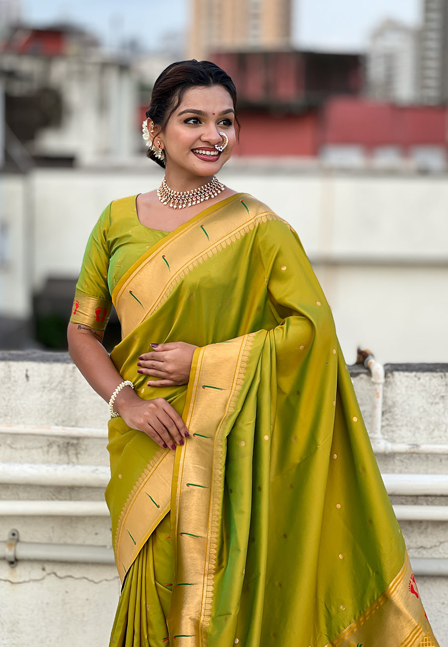 Mehendi Green Zari Woven Mahalaxmi God Paithani Silk Saree Paithani Saree Anant Tex Exports Pvt.Ltd..