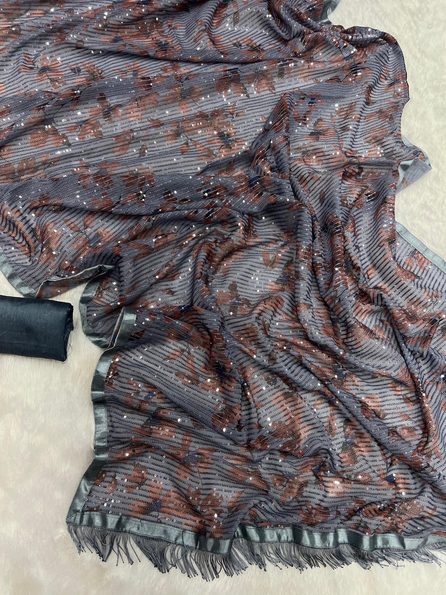 Beautiful Designer Heavy Georgette Exclusive Sequanc Saree Design 5299