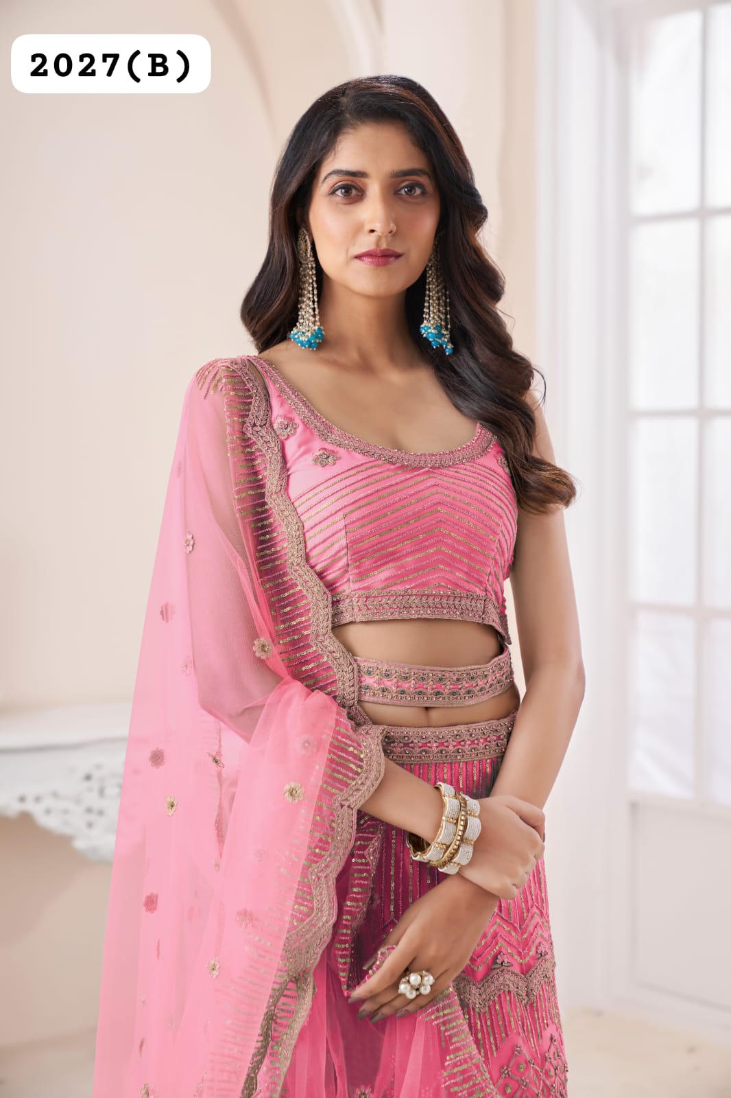 Beautiful Designer Remarkable Coral Pink Sequins Work Net Wedding Lehenga Choli