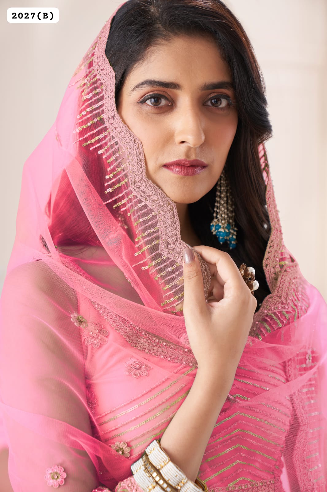 Beautiful Designer Remarkable Coral Pink Sequins Work Net Wedding Lehenga Choli