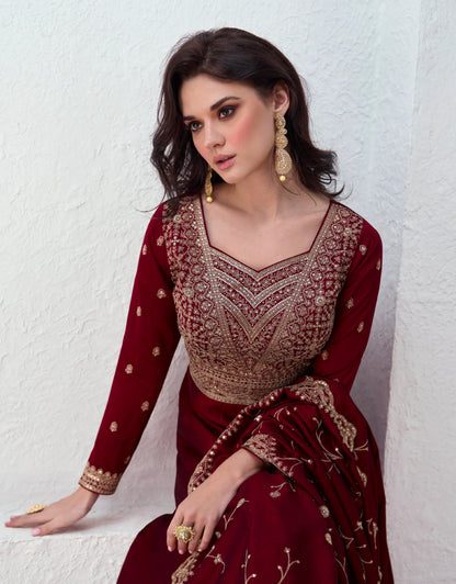 Red embroidered premium silk Anarkali suit with dupatta for weddings and festivals.