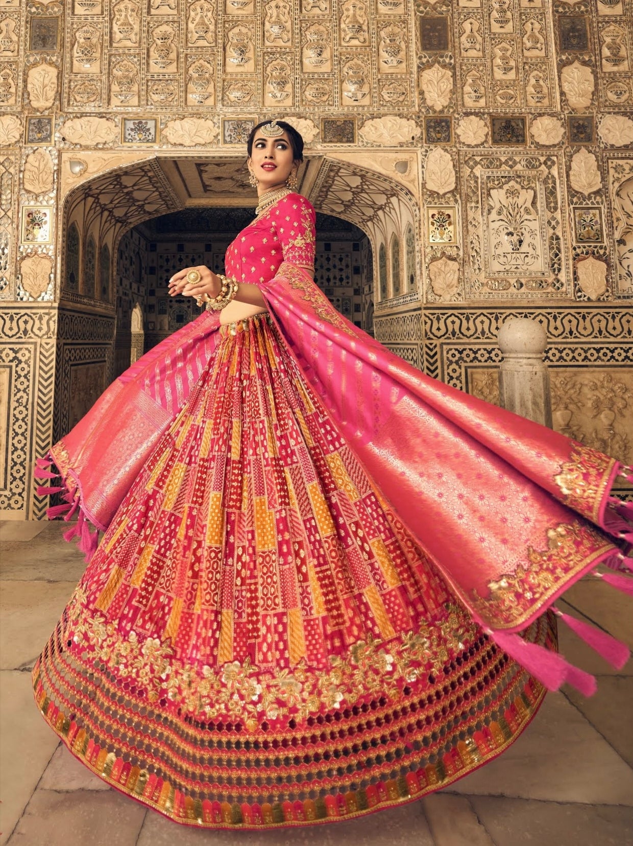 Pink Banarasi lehenga choli with zari border front view

