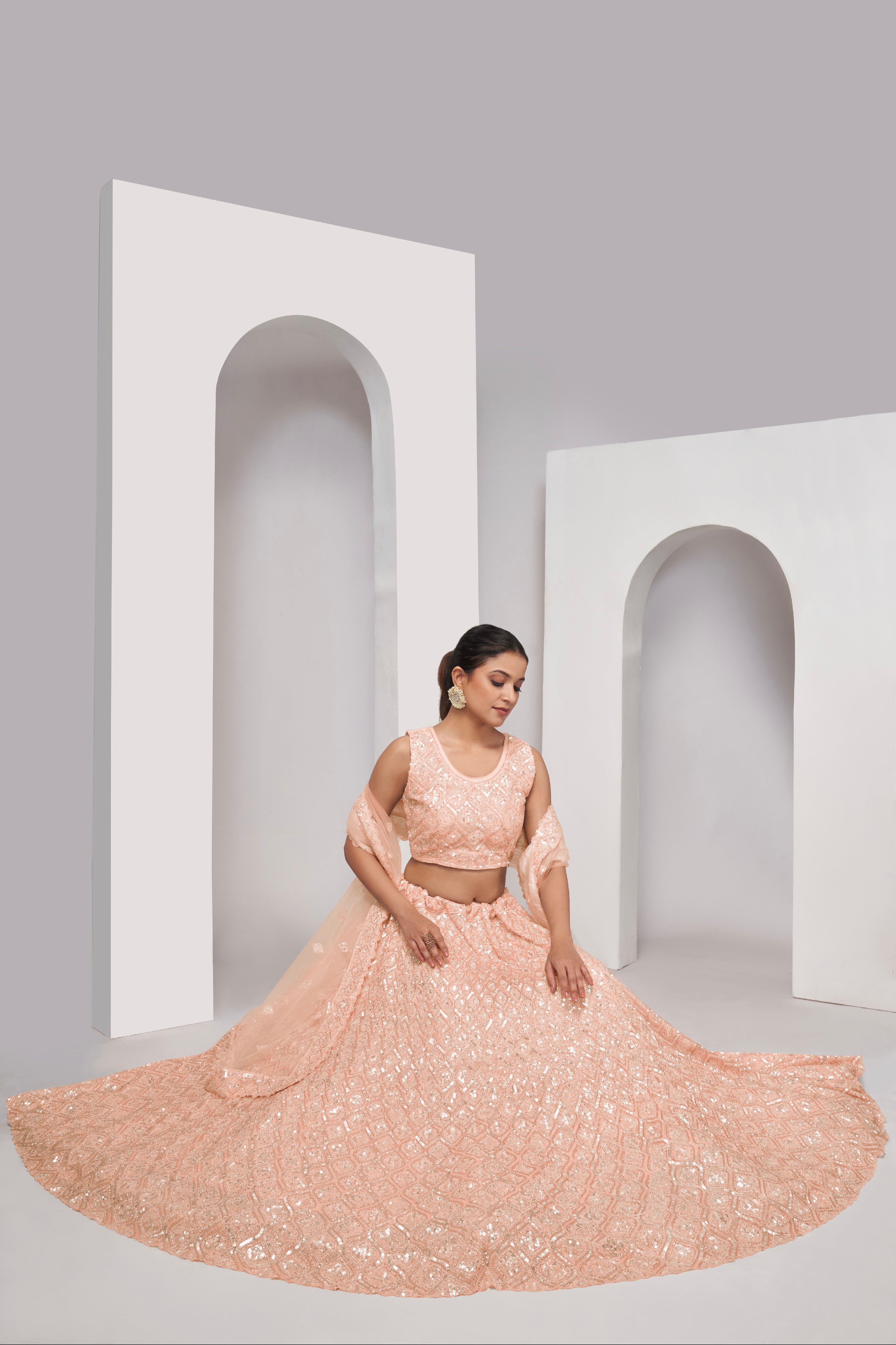 Elegant Peach Soft Net Lehenga Choli with Diamond Sequin Work