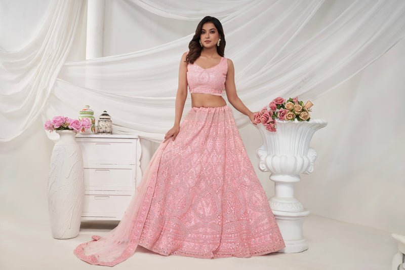 Elegant Pink Soft Net Lehenga Choli with Geometric Rhinestone Work