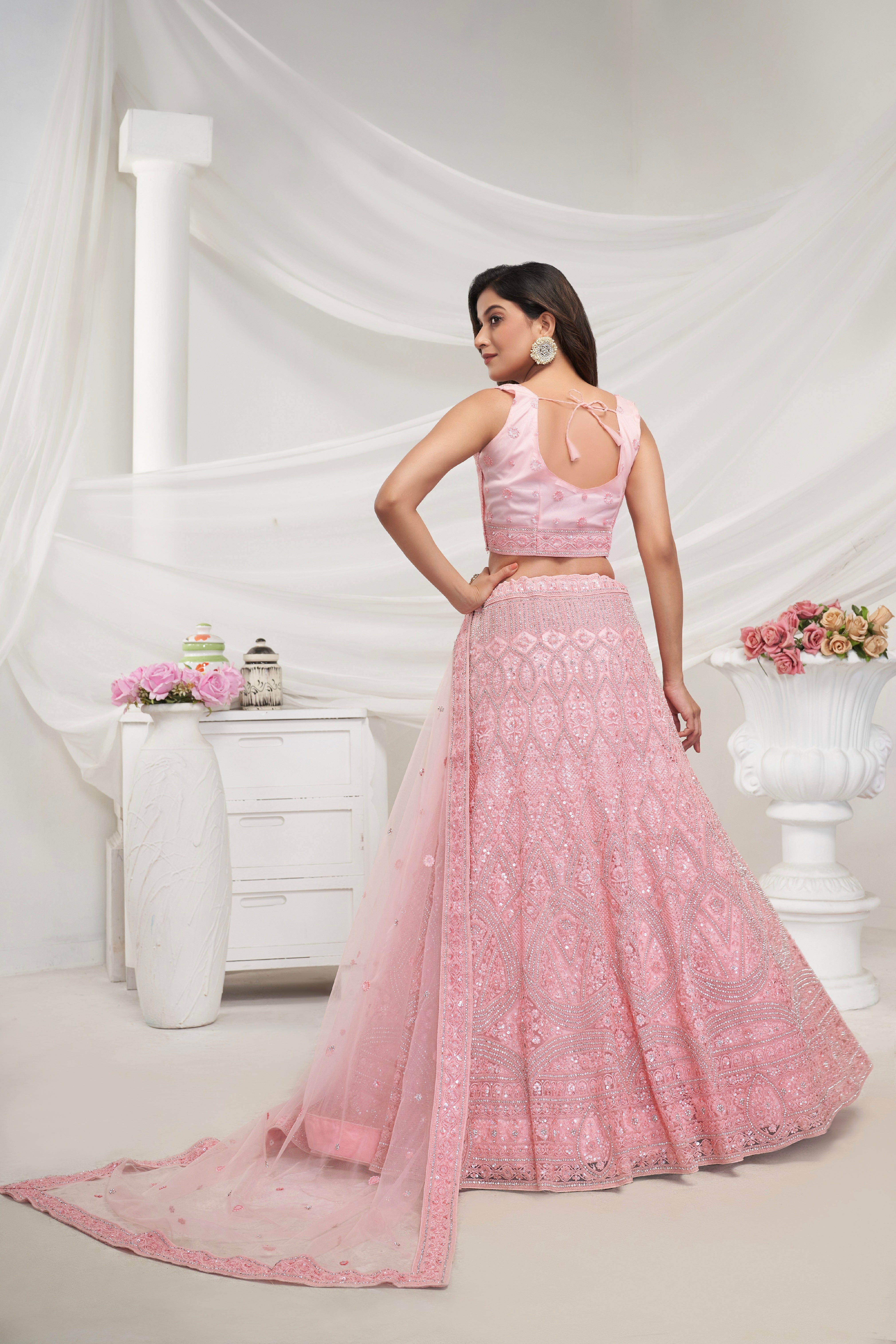 Elegant Pink Soft Net Lehenga Choli with Geometric Rhinestone Work
