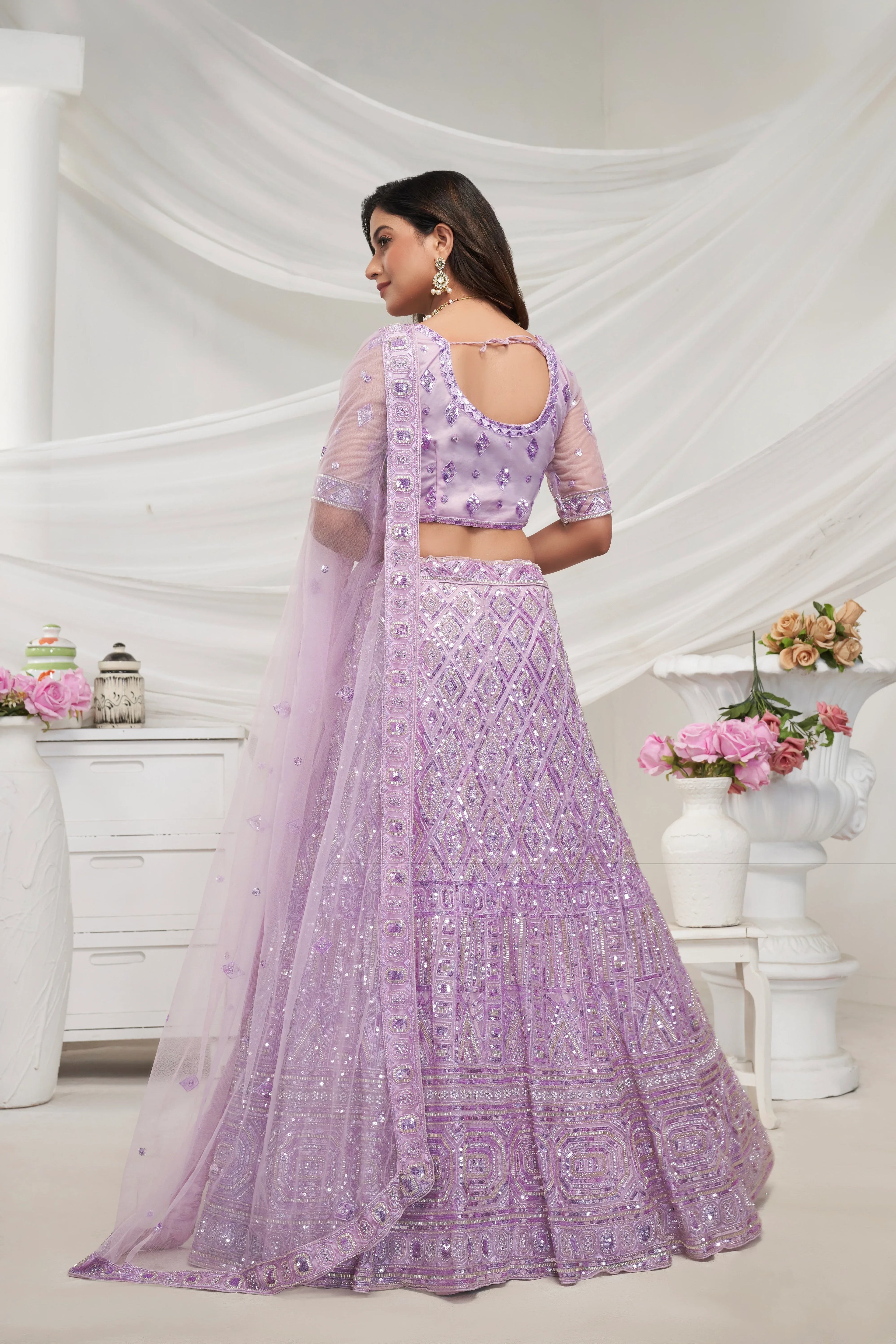 Elegant Mauve Soft Net Lehenga Choli with Pearl &amp; Diamond Sequin Work