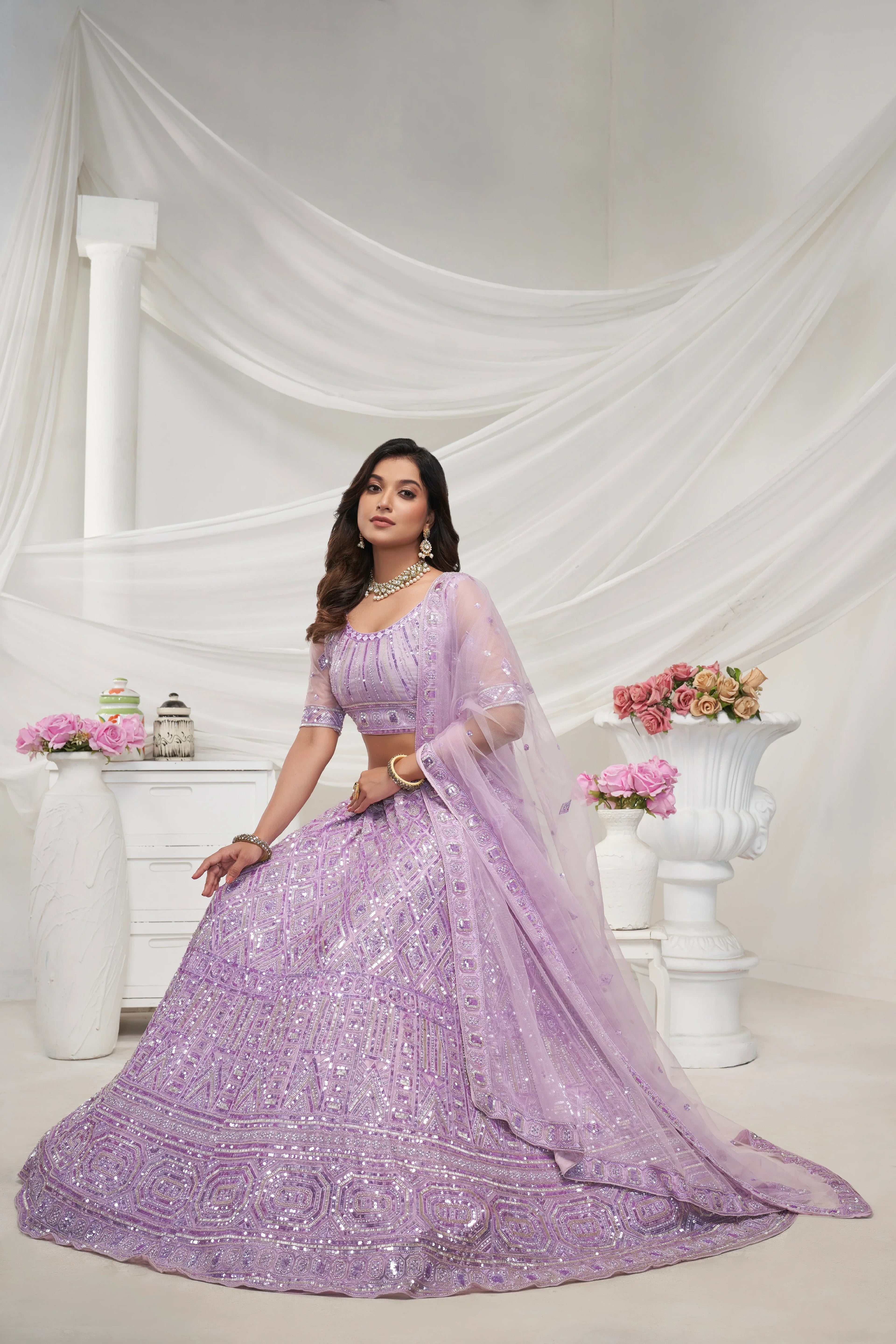 Elegant Mauve Soft Net Lehenga Choli with Pearl &amp; Diamond Sequin Work