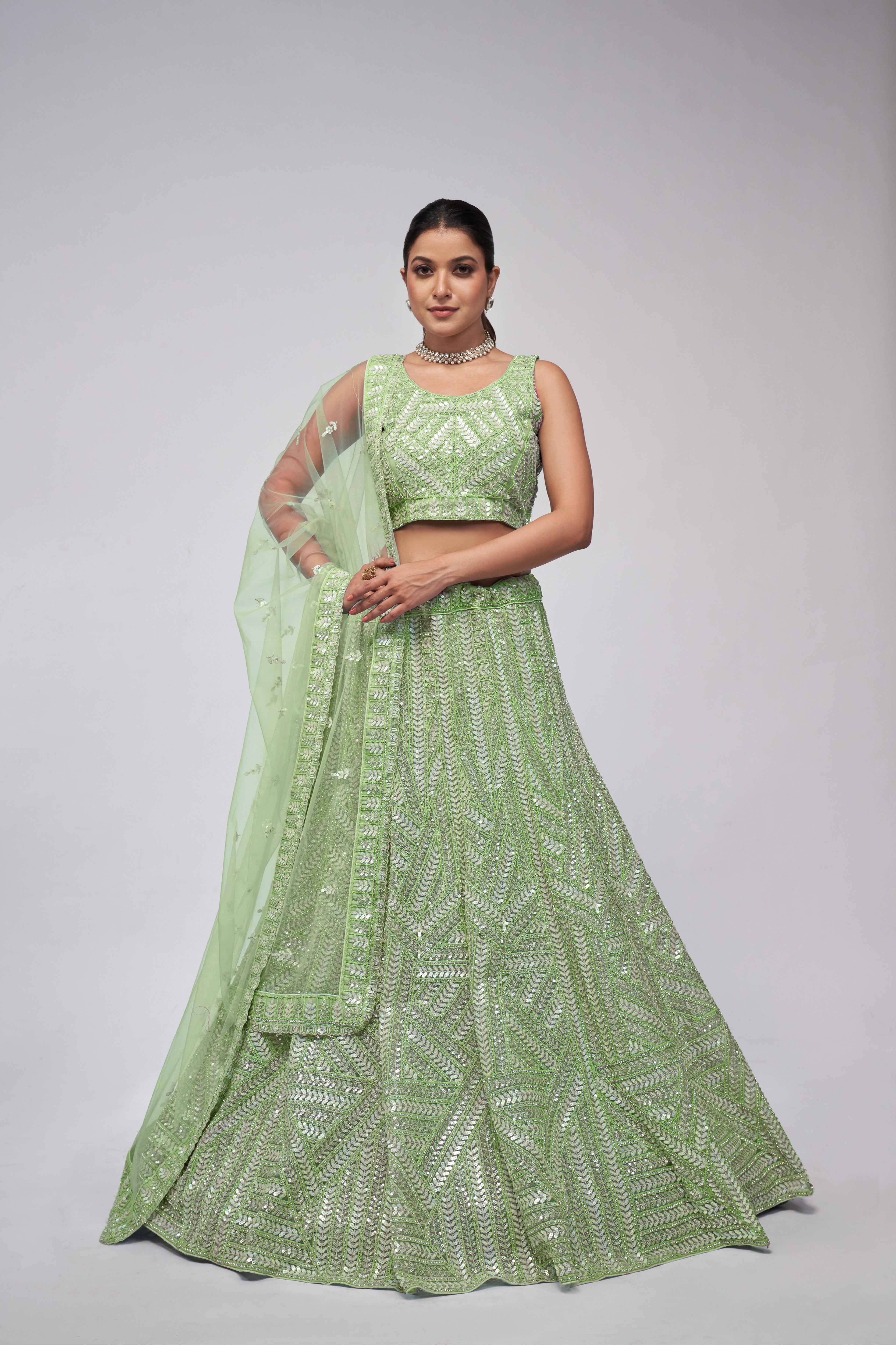 Elegant Green Net Lehenga with Sequin Leaves - Bridal Wear