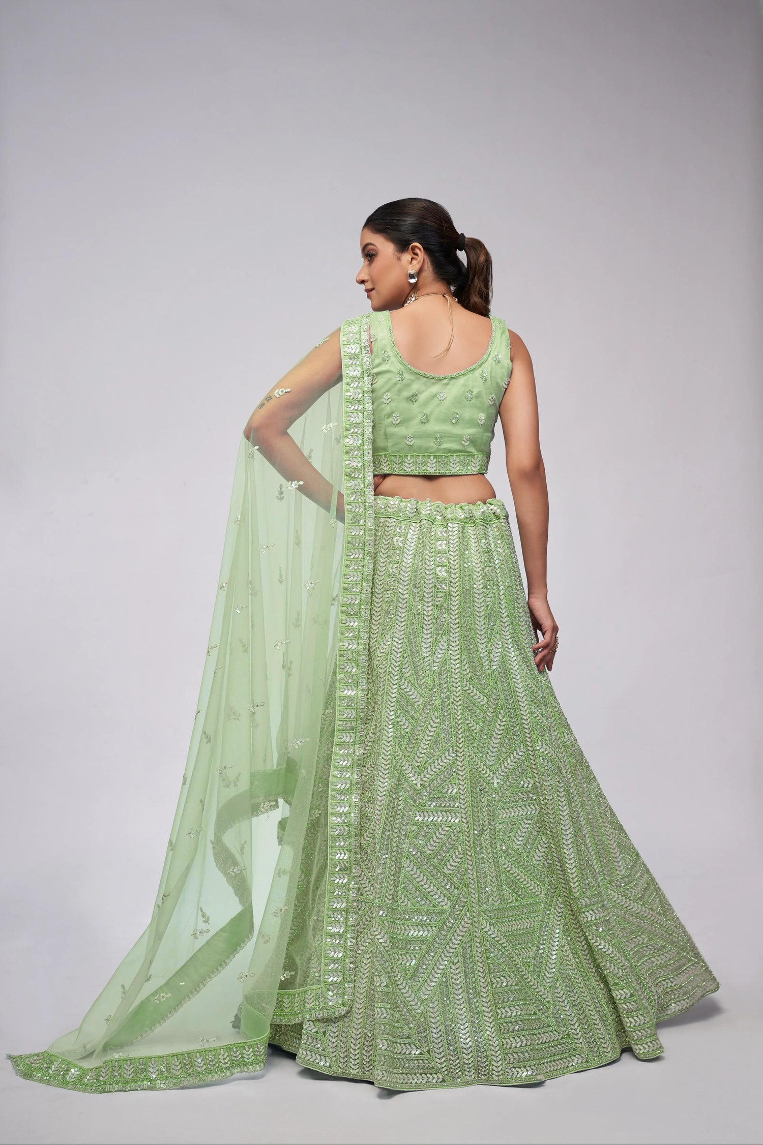 Elegant Green Net Lehenga with Sequin Leaves - Bridal Wear