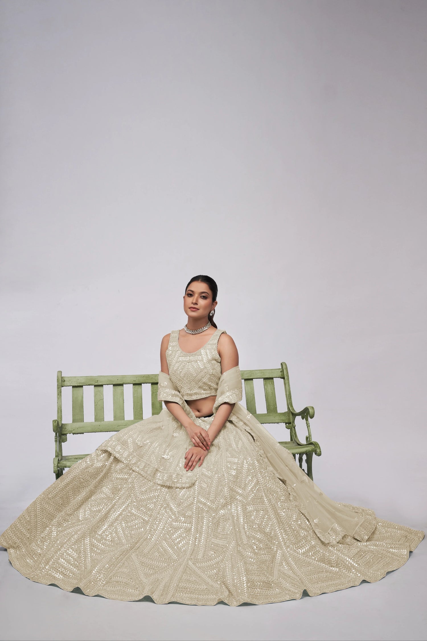 Elegant Ivory Lehenga with Sequins Work and Matching Dupatta