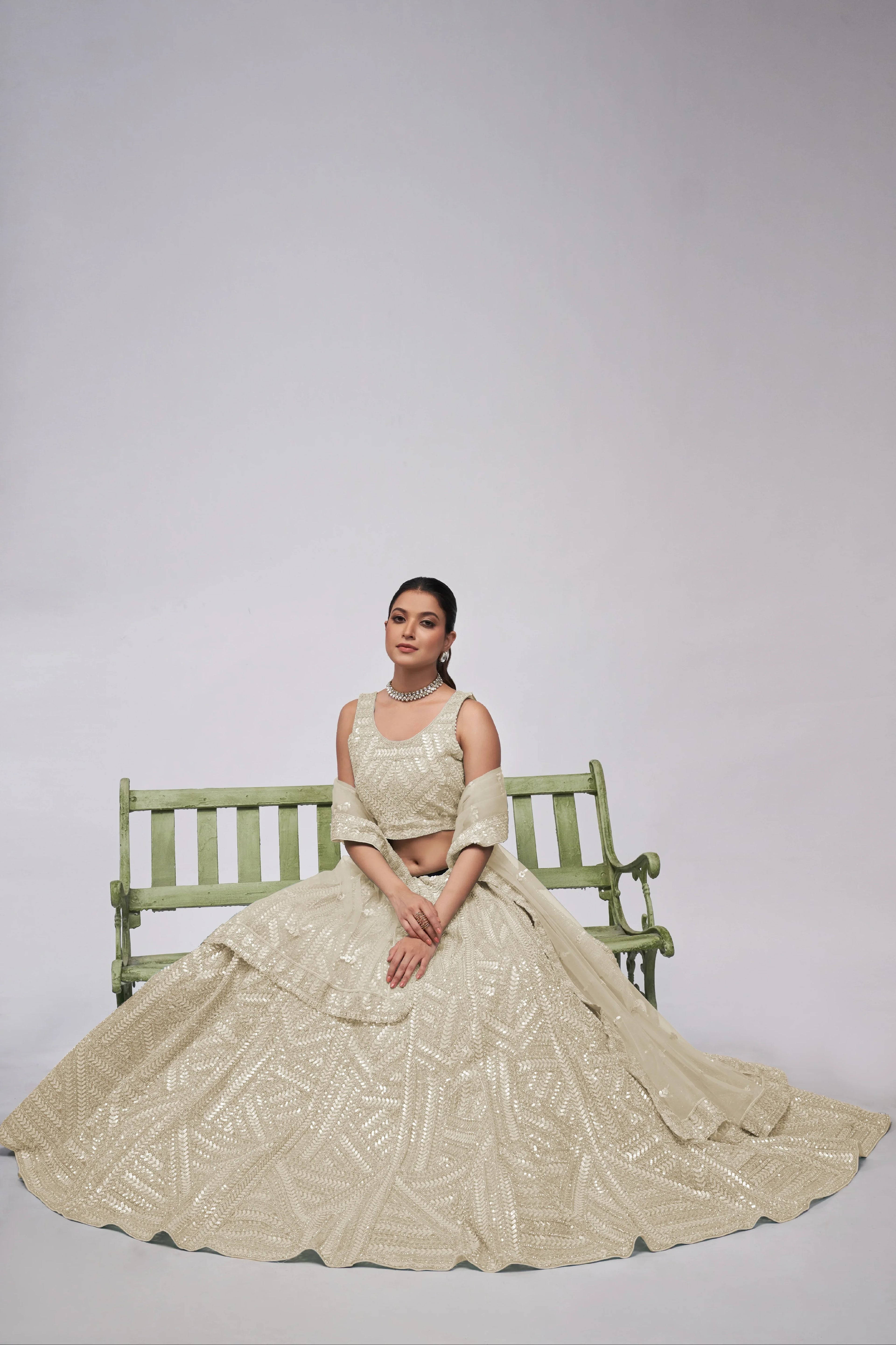 Elegant Ivory Lehenga with Sequins Work and Matching Dupatta