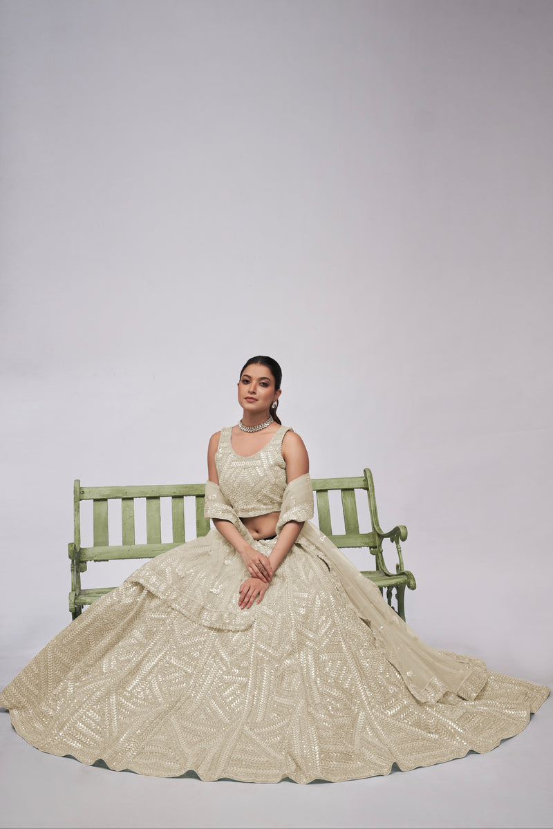 Elegant Ivory Lehenga with Sequins Work and Matching Dupatta
