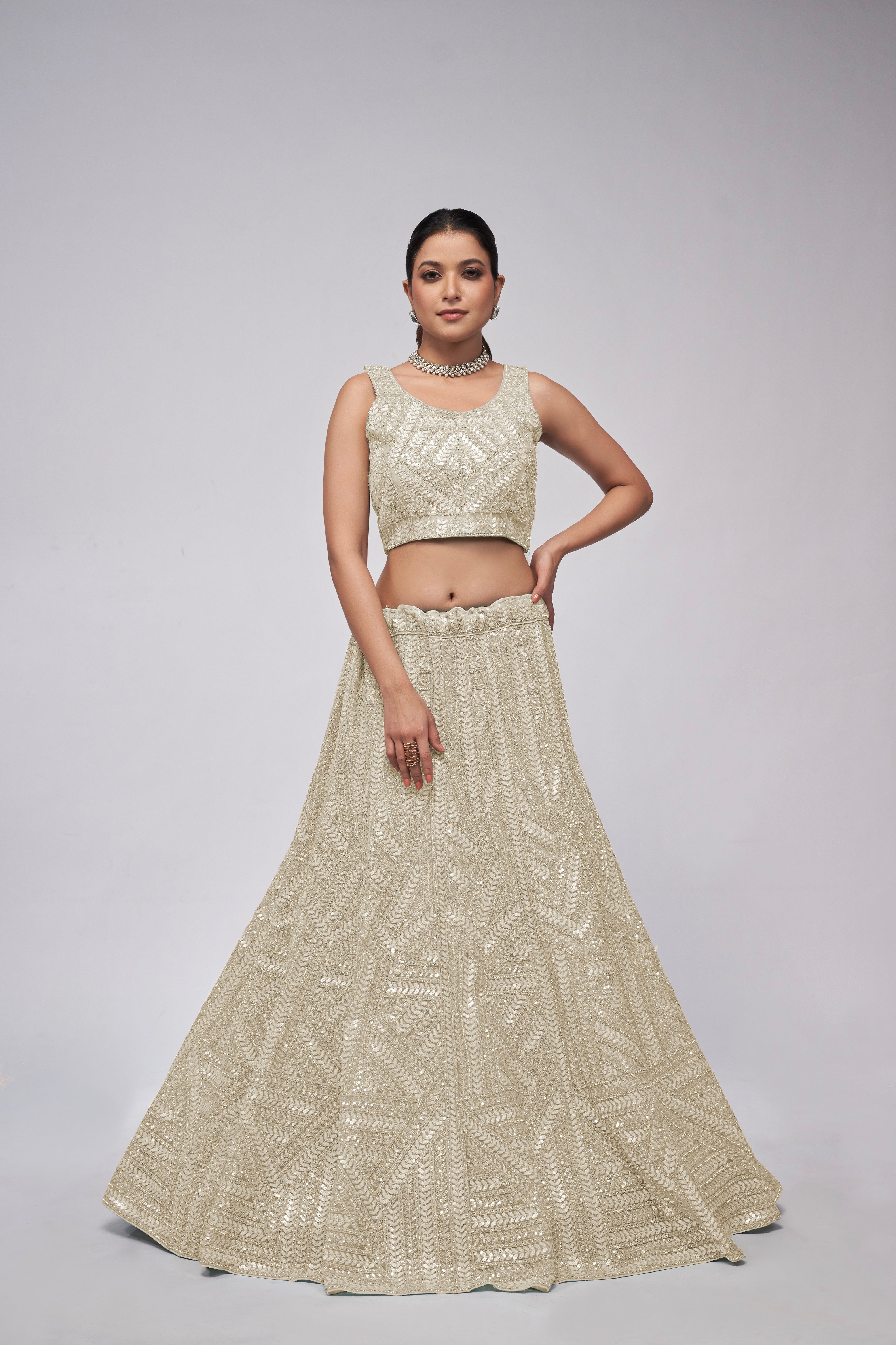 Elegant Ivory Lehenga with Sequins Work and Matching Dupatta