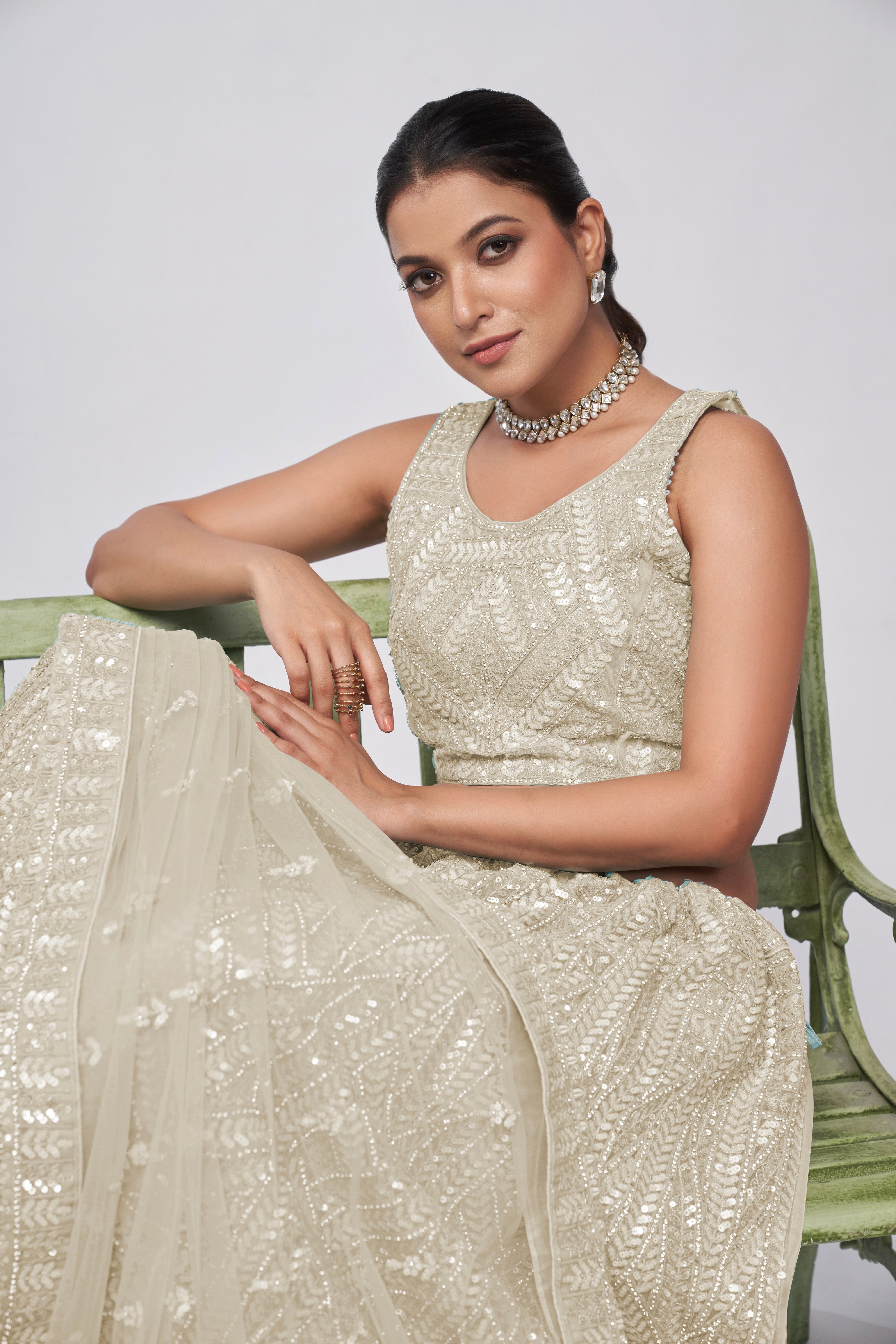 Elegant Ivory Lehenga with Sequins Work and Matching Dupatta