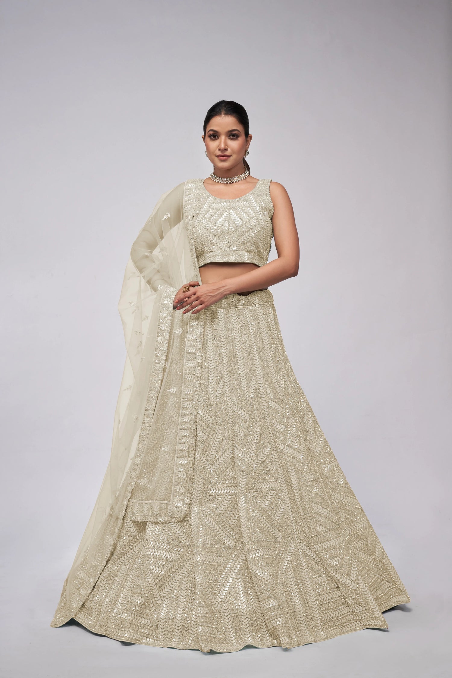Elegant Ivory Lehenga with Sequins Work and Matching Dupatta