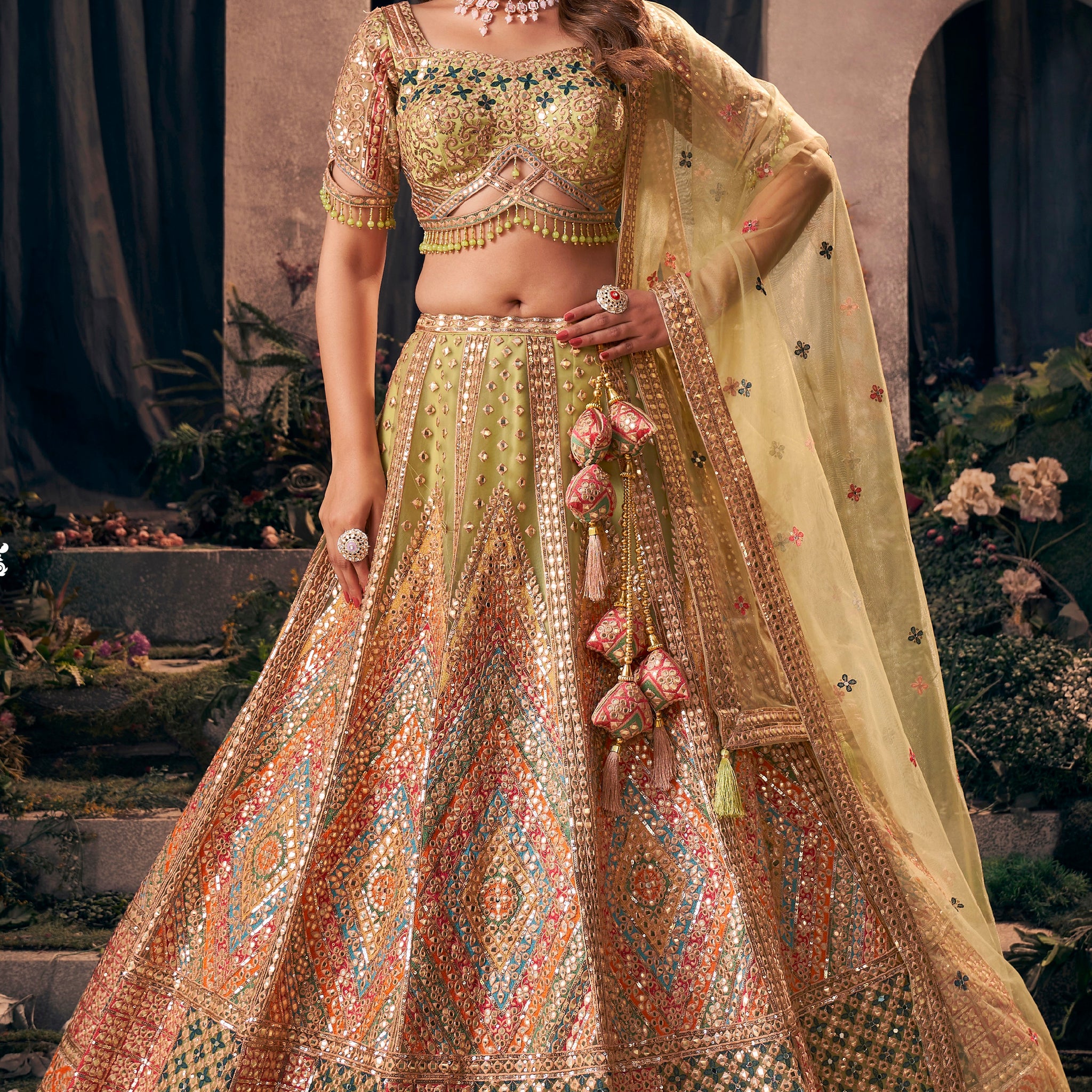 Multicolor designer bridal lehenga with gotapatti and hand work embroidery.