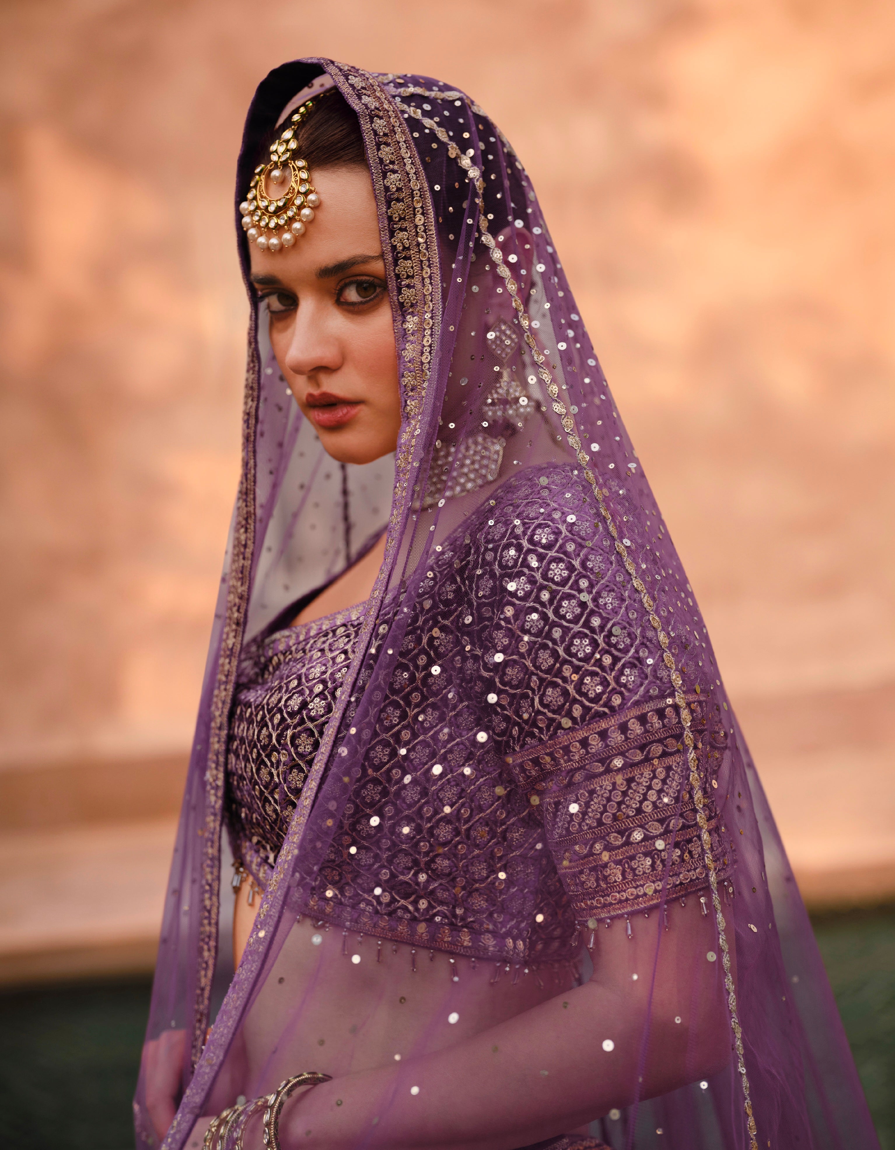 Purple Bridal Lehenga in Pure Silk with Handwork Blouse and Embroidered Dupatta.