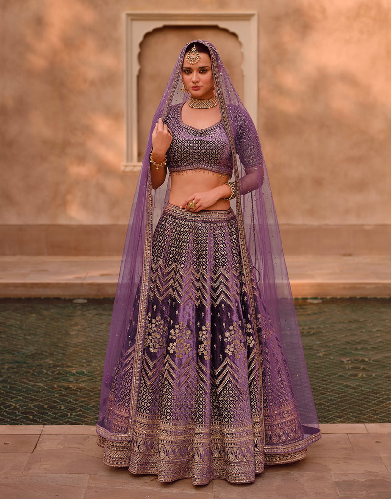 Purple Bridal Lehenga in Pure Silk with Handwork Blouse and Embroidered Dupatta.
