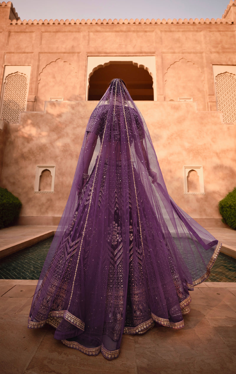 Purple Bridal Lehenga in Pure Silk with Handwork Blouse and Embroidered Dupatta.