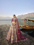 Elegant gold silk bridal lehenga with maroon embroidered blouse and dupatta.