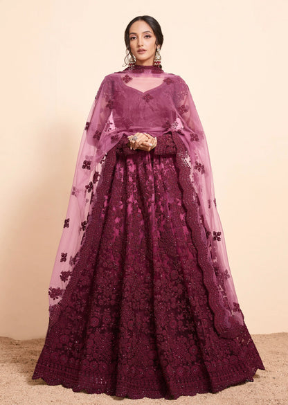 Rich Wine Net Lehenga Choli Set with Heavy Stone Work Embellishment